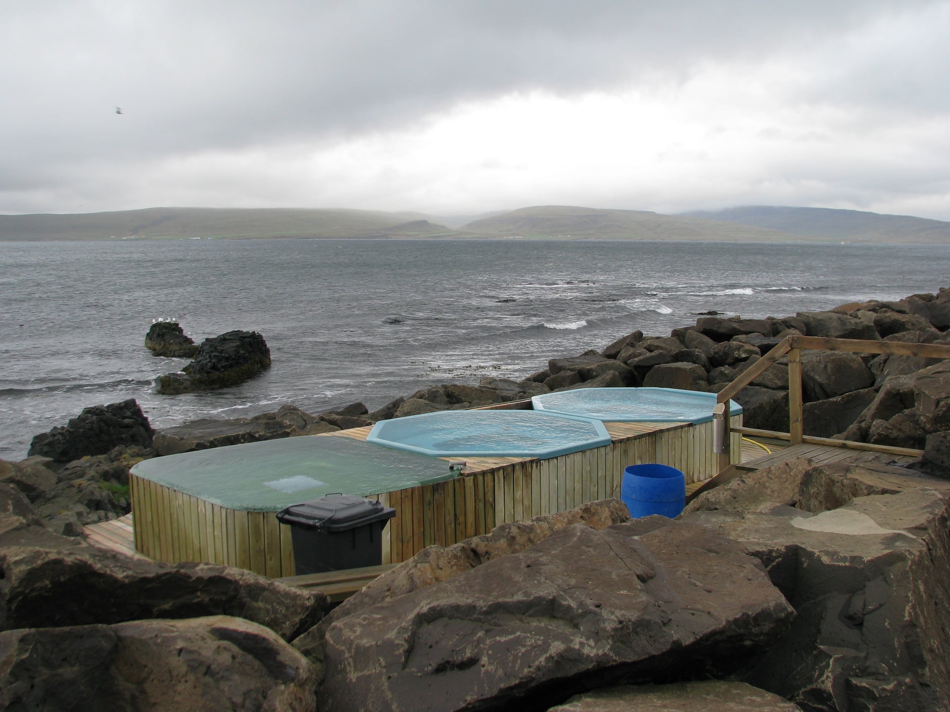Hot pots on the shore at Drangsnes in the Westfjords of Iceland