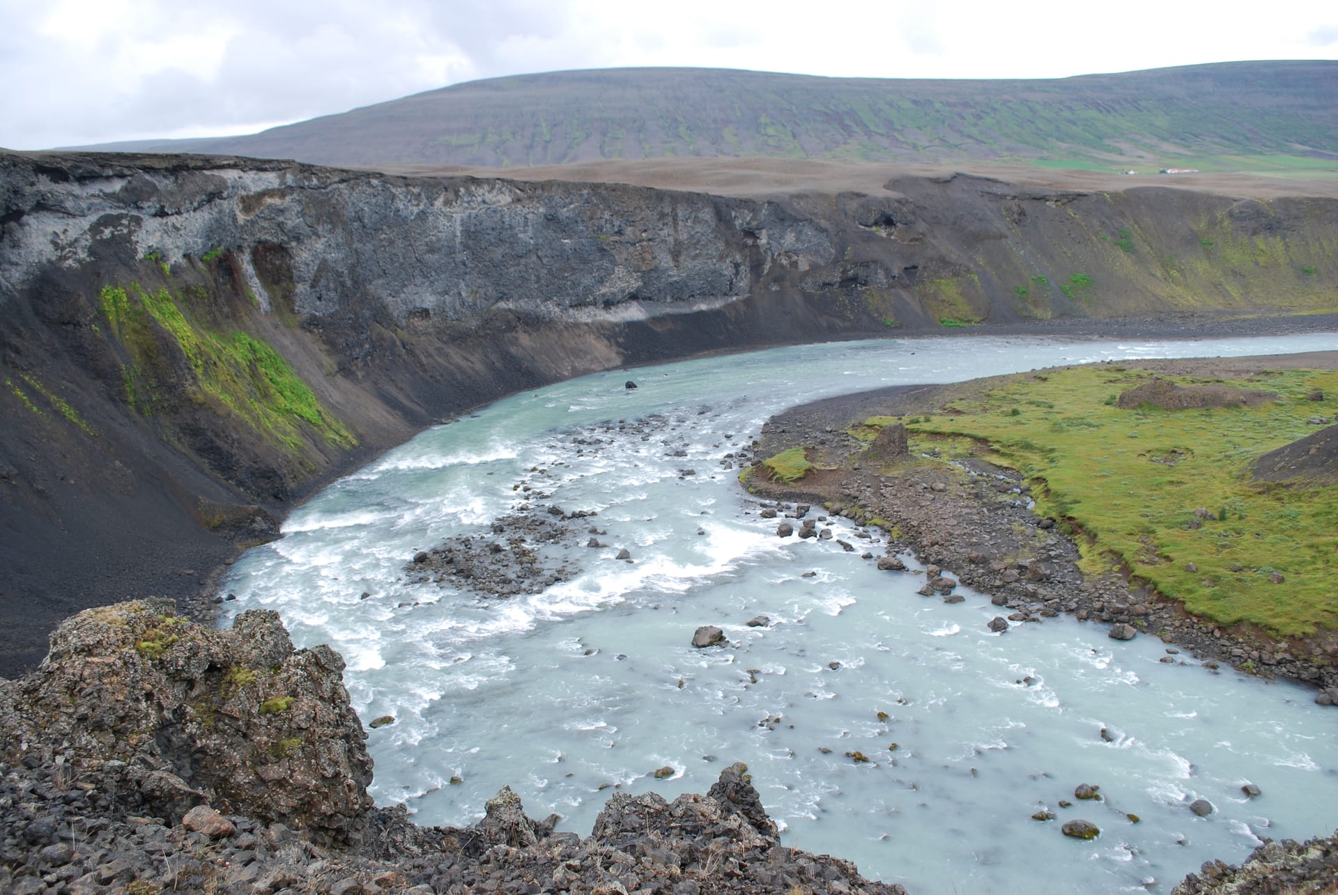 Aldeyjarfoss waterfall with black basalt columns in Iceland