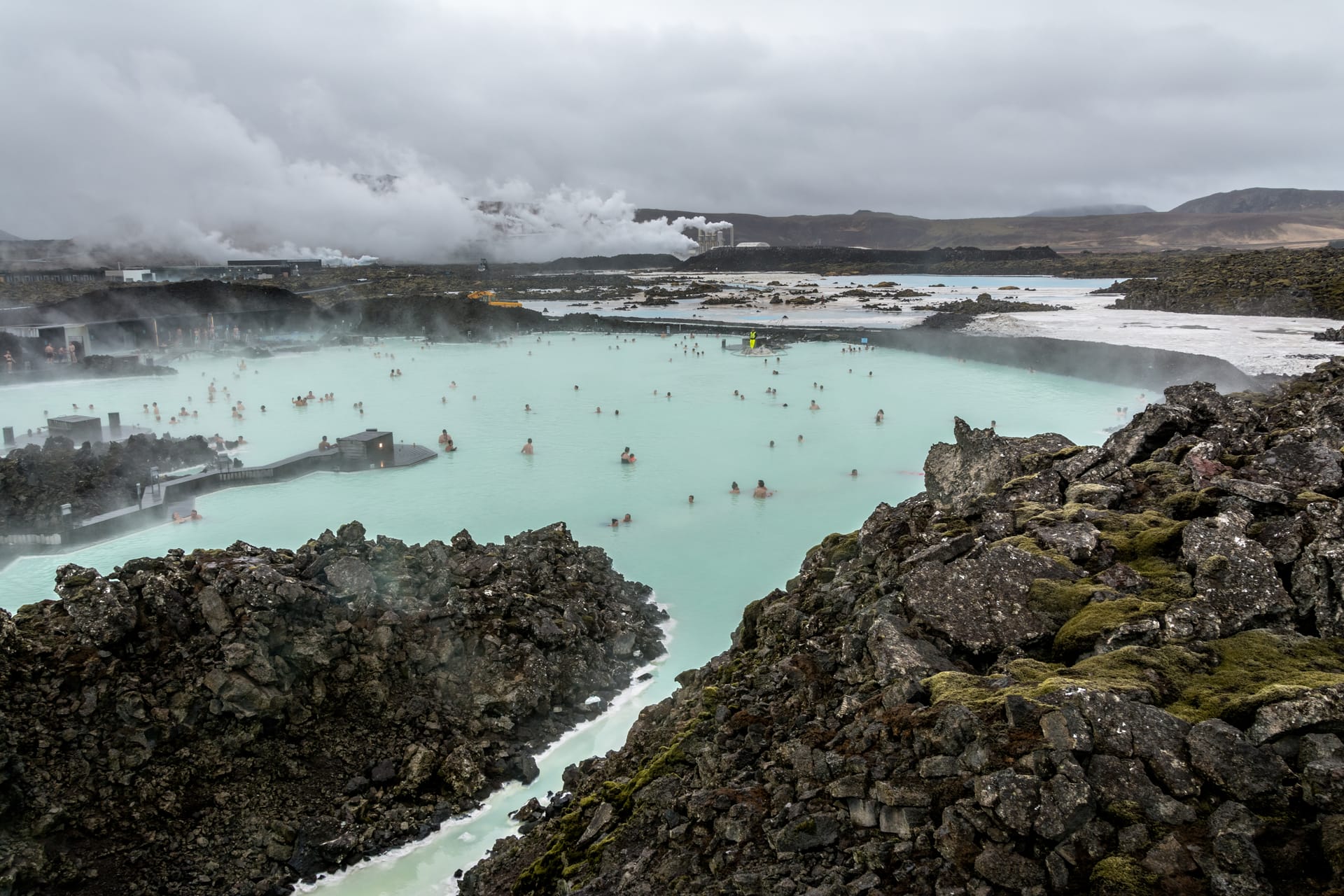 Blue Lagoon geothermal spa in Iceland surrounded by dark lava