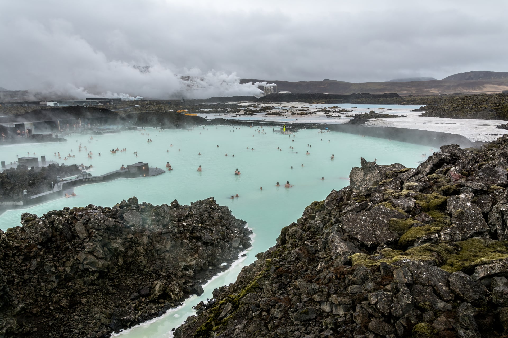 Blue Lagoon geothermal spa in Iceland surrounded by dark lava